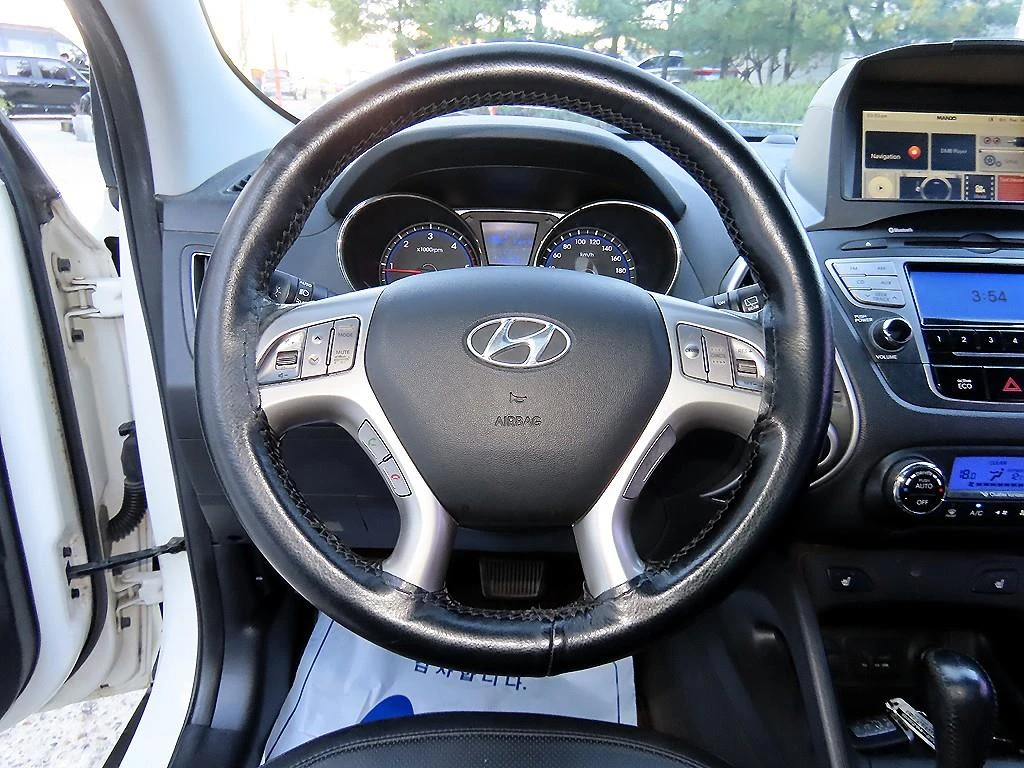 Hyundai Tucson ix, 2012 — фото 8